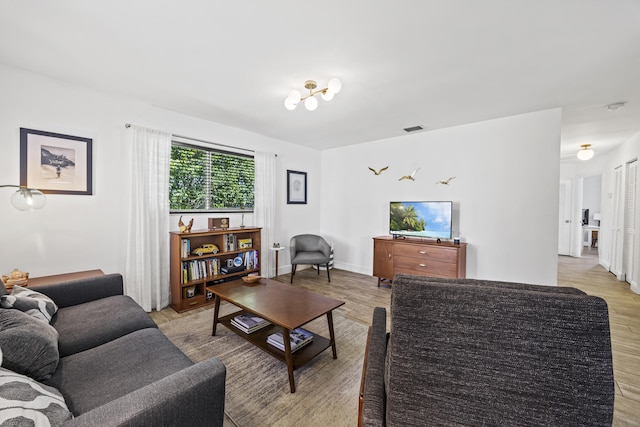407 Riverside Dr, Palm Beach Gardens, FL 33410 - living room with light wood-type flooring