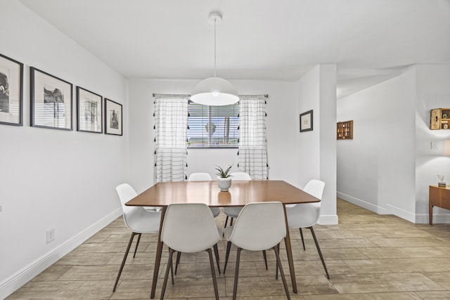 407 Riverside Dr, Palm Beach Gardens, FL 33410 - dining room featuring wood finished floors and baseboards