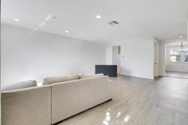 500 Pacific Grove 3 Dr Unit 3, West Palm Beach, FL 33401 - living area featuring light wood finished floors, recessed lighting, and baseboards