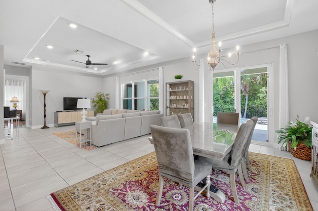 4652 Saxon Rd, Coconut Creek, FL 33073 - dining room with a tray ceiling, a chandelier, a ceiling fan, light tile patterned floors, and recessed lighting