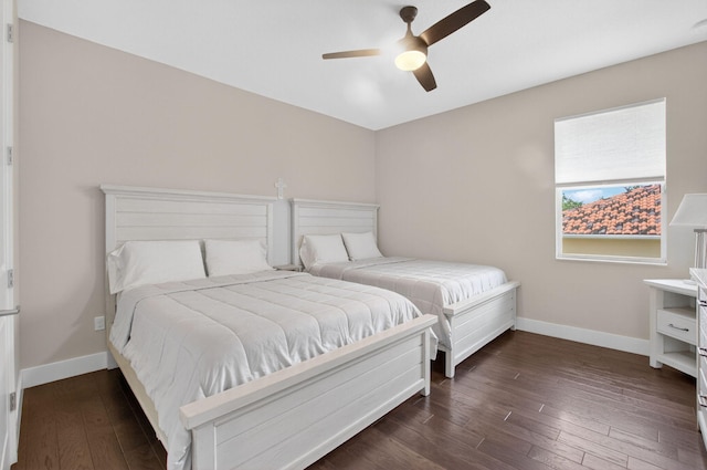 4652 Saxon Rd, Coconut Creek, FL 33073 - bedroom with baseboards, hardwood / wood-style flooring, and a ceiling fan