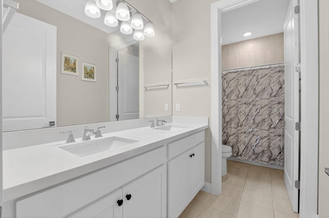 4652 Saxon Rd, Coconut Creek, FL 33073 - full bath featuring toilet, double vanity, tile patterned floors, curtained shower, and tile walls