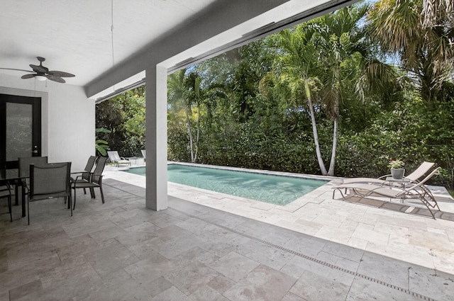 4652 Saxon Rd, Coconut Creek, FL 33073 - swimming pool with a ceiling fan, a patio, and outdoor dining area