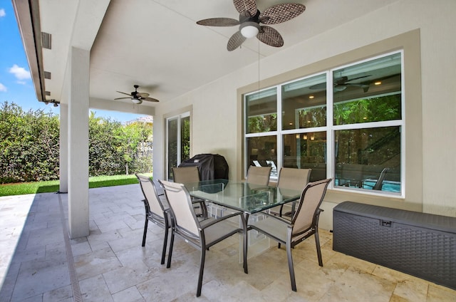 4652 Saxon Rd, Coconut Creek, FL 33073 - view of patio / terrace with ceiling fan, outdoor dining area, area for grilling, and radiator heating unit