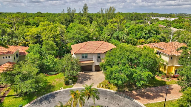 4652 Saxon Rd, Coconut Creek, FL 33073 - view from above of property with a heavily wooded area