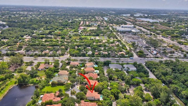 4652 Saxon Rd, Coconut Creek, FL 33073 - aerial overview of property's location with a large body of water and nearby suburban area