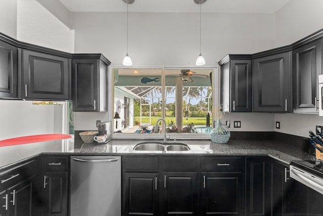 165 SE Osprey Rdg, Port Saint Lucie, FL 34984 - kitchen featuring appliances with stainless steel finishes, a sink, dark cabinets, and ceiling fan