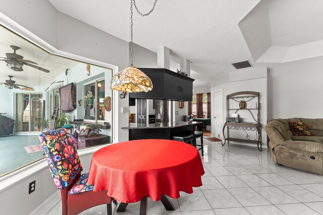 165 SE Osprey Rdg, Port Saint Lucie, FL 34984 - dining space featuring ceiling fan and light tile patterned floors