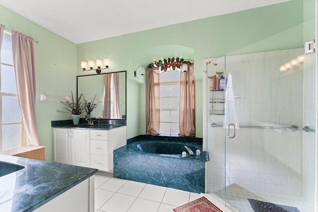 165 SE Osprey Rdg, Port Saint Lucie, FL 34984 - full bath featuring vanity, a bath, a stall shower, and tile patterned floors