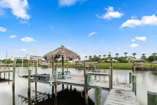 165 SE Osprey Rdg, Port Saint Lucie, FL 34984 - dock area featuring boat lift and a water view