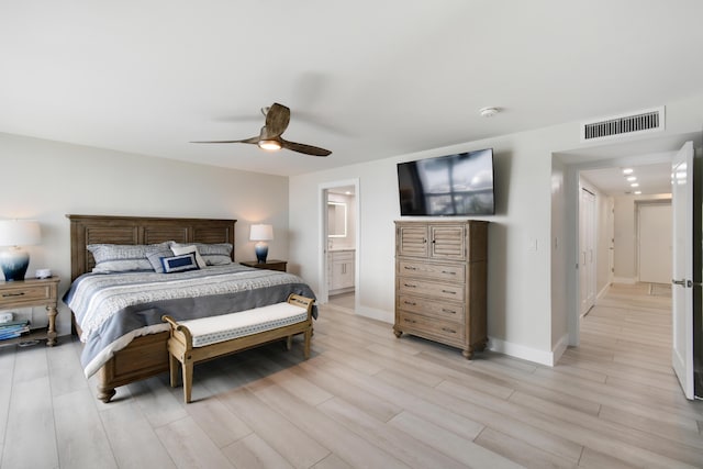 123 Lakeshore Dr Unit 1145, North Palm Beach, FL 33408 - bedroom with light wood-style flooring, ceiling fan, baseboards, and ensuite bathroom