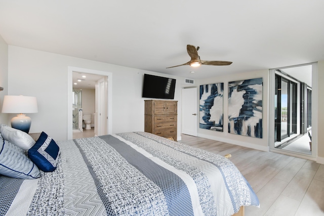 123 Lakeshore Dr Unit 1145, North Palm Beach, FL 33408 - bedroom featuring light wood finished floors, access to exterior, ceiling fan, and connected bathroom