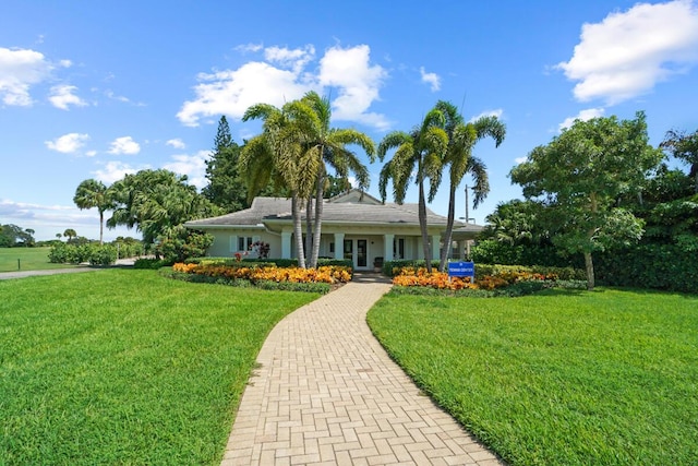 123 Lakeshore Dr Unit 1145, North Palm Beach, FL 33408 - single story home with a front lawn and french doors