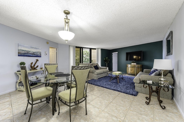 2800 N Ocean Dr Unit A-2B, Singer Island, FL 33404 - dining space featuring a textured ceiling