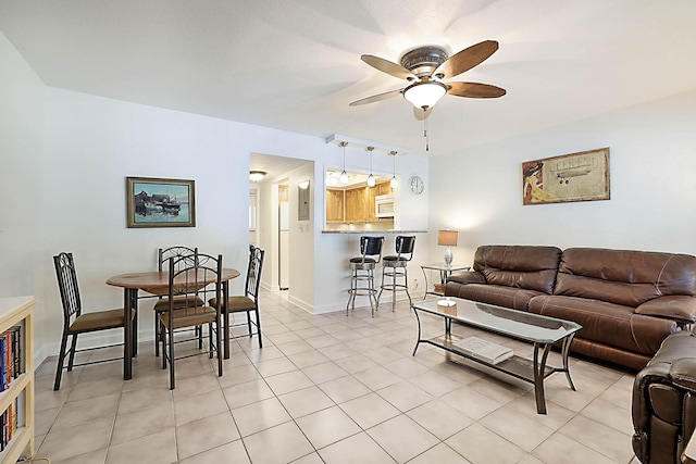 2501 N Ocean Blvd Unit 3, Pompano Beach, FL 33062 - living room with a ceiling fan and light tile patterned floors