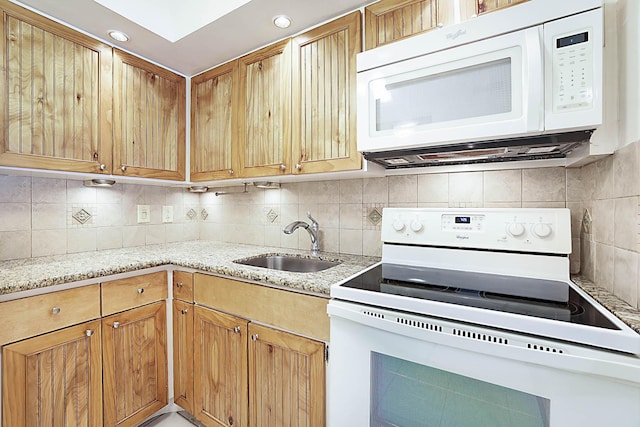 2501 N Ocean Blvd Unit 3, Pompano Beach, FL 33062 - kitchen featuring white appliances, backsplash, and light stone countertops