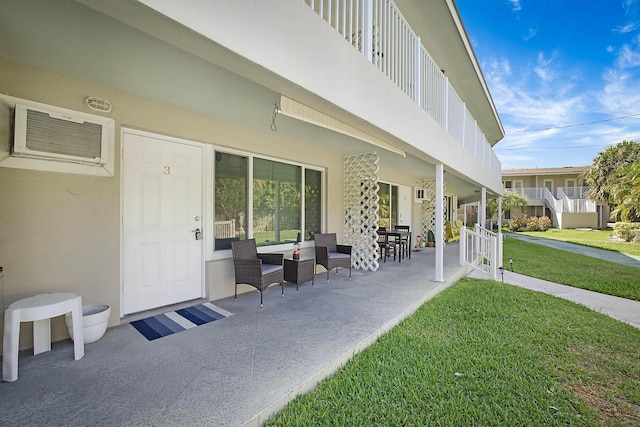 2501 N Ocean Blvd Unit 3, Pompano Beach, FL 33062 - view of patio featuring a wall unit AC