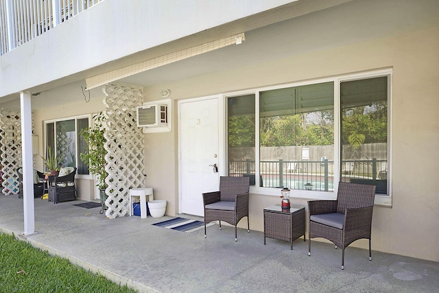2501 N Ocean Blvd Unit 3, Pompano Beach, FL 33062 - view of patio with a wall mounted AC