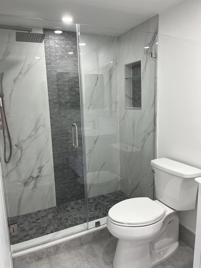 3033 Wolverton B, Boca Raton, FL 33434 - full bathroom featuring toilet and a marble finish shower