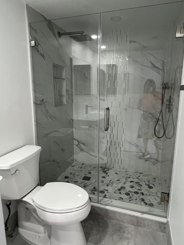3033 Wolverton B, Boca Raton, FL 33434 - full bathroom featuring toilet and a marble finish shower