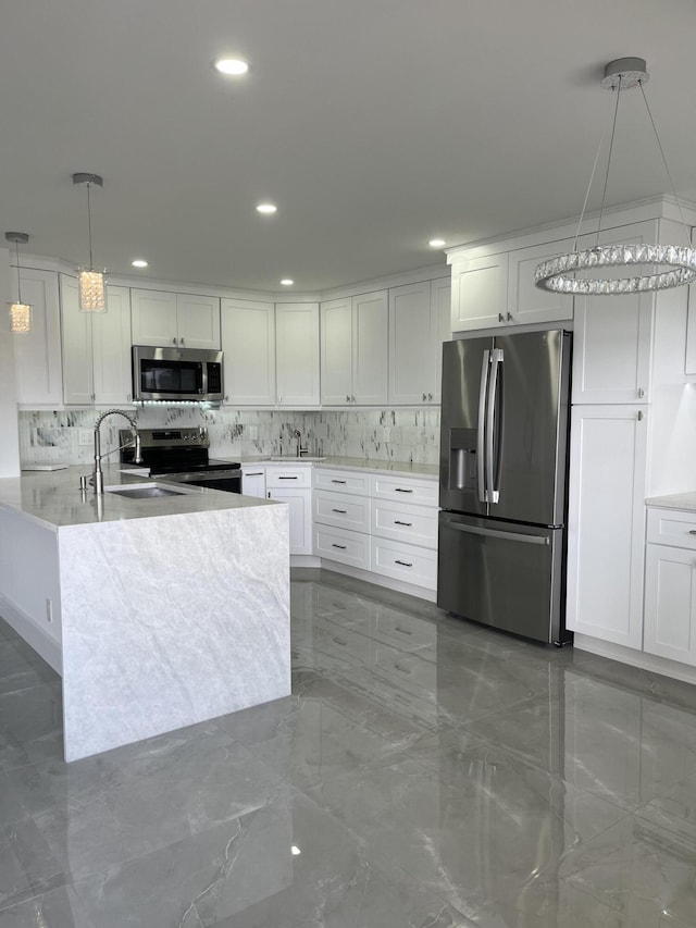 3033 Wolverton B, Boca Raton, FL 33434 - kitchen featuring appliances with stainless steel finishes, backsplash, white cabinets, and recessed lighting