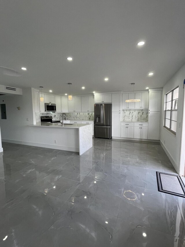 3033 Wolverton B, Boca Raton, FL 33434 - unfurnished living room featuring recessed lighting and marble tiled flooring