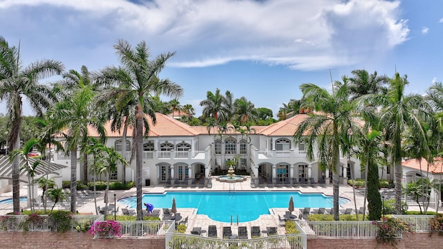 11013 Legacy Ln Unit 103, Palm Beach Gardens, FL 33410 - community pool with a patio