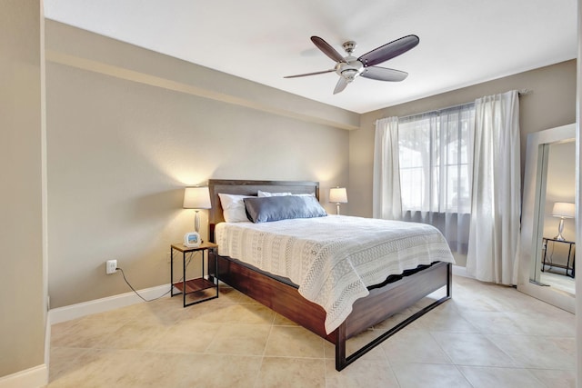 11013 Legacy Ln Unit 103, Palm Beach Gardens, FL 33410 - bedroom featuring light tile patterned floors and ceiling fan