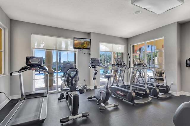 11013 Legacy Ln Unit 103, Palm Beach Gardens, FL 33410 - gym with baseboards