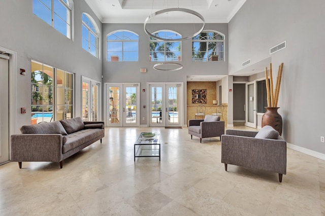 11013 Legacy Ln Unit 103, Palm Beach Gardens, FL 33410 - building lobby featuring ornamental molding and a high ceiling