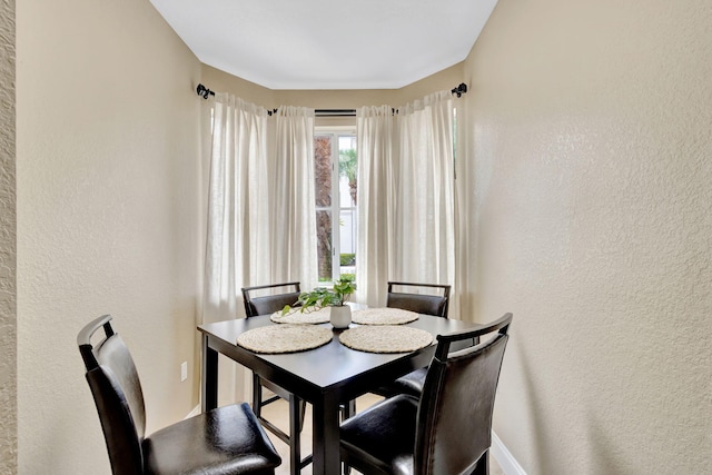 11013 Legacy Ln Unit 103, Palm Beach Gardens, FL 33410 - dining area featuring a textured wall