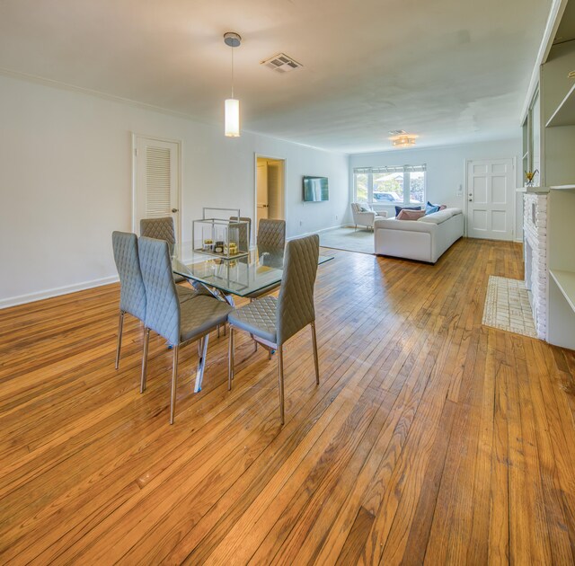 1714 N Palmway, Lake Worth Beach, FL 33460 - dining space with hardwood / wood-style floors and baseboards
