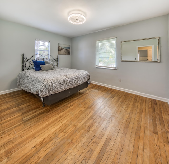 1714 N Palmway, Lake Worth Beach, FL 33460 - bedroom featuring baseboards and hardwood / wood-style flooring