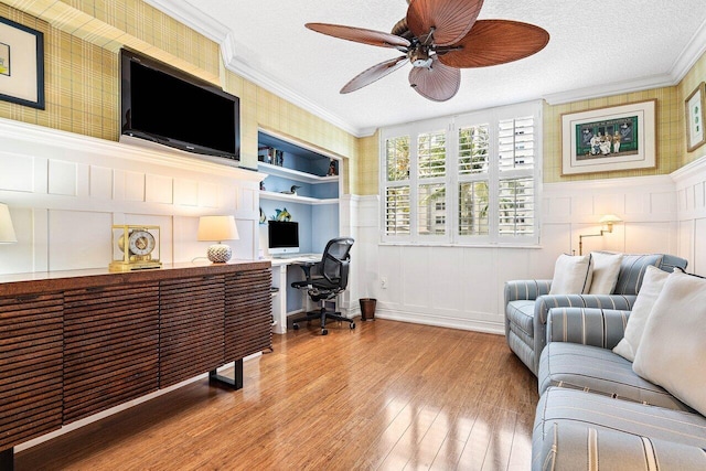 3606 S Ocean Blvd Unit 201, Highland Beach, FL 33487 - home office featuring a ceiling fan, wood finished floors, a textured ceiling, crown molding, and built in features