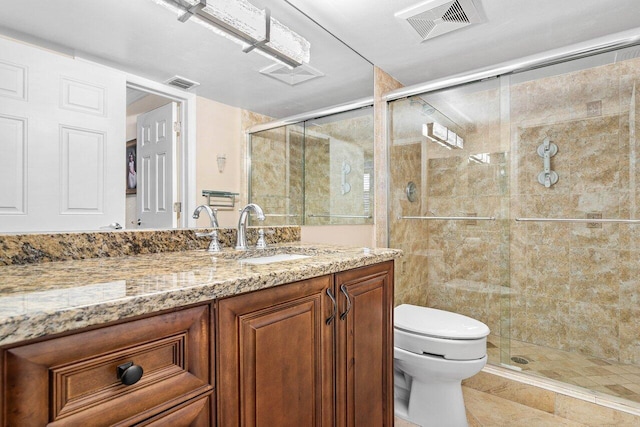 3606 S Ocean Blvd Unit 201, Highland Beach, FL 33487 - bathroom featuring toilet, vanity, and a stall shower
