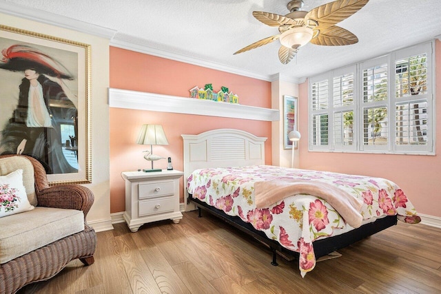 3606 S Ocean Blvd Unit 201, Highland Beach, FL 33487 - bedroom with wood finished floors, baseboards, ornamental molding, ceiling fan, and a textured ceiling
