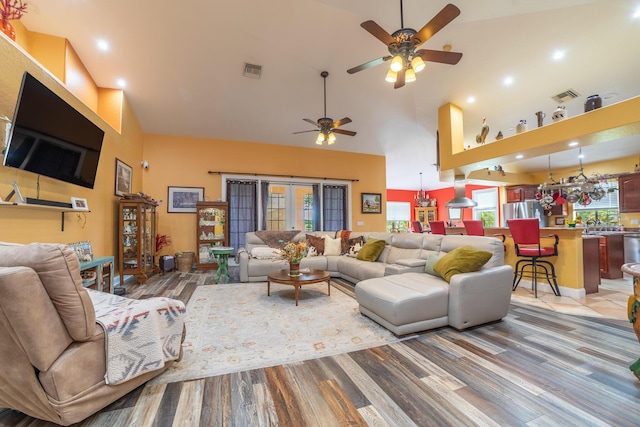 7611 SW 21st Pkwy, Okeechobee, FL 34974 - living area with high vaulted ceiling, a ceiling fan, light wood finished floors, and recessed lighting