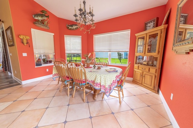7611 SW 21st Pkwy, Okeechobee, FL 34974 - dining space featuring a chandelier and baseboards