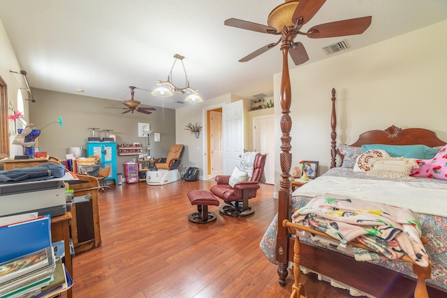 7611 SW 21st Pkwy, Okeechobee, FL 34974 - bedroom featuring hardwood / wood-style floors