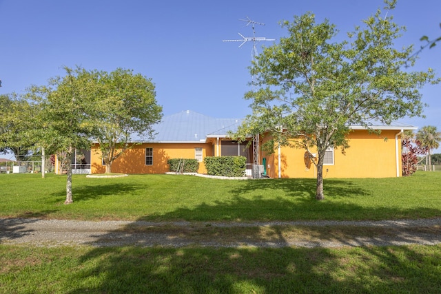 7611 SW 21st Pkwy, Okeechobee, FL 34974 - single story home featuring a front yard and stucco siding