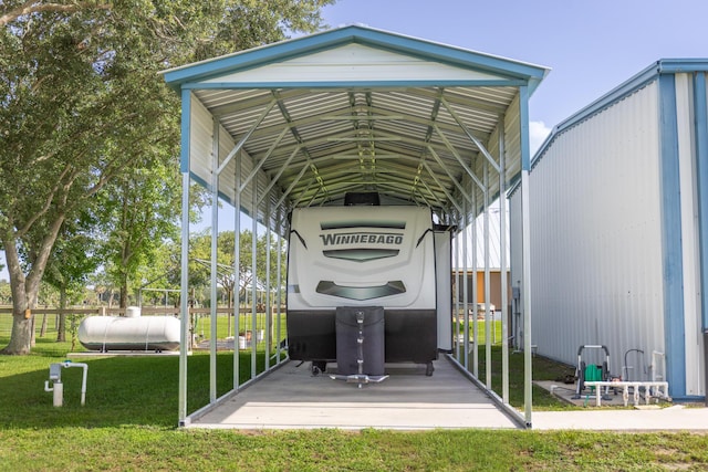 7611 SW 21st Pkwy, Okeechobee, FL 34974 - view of car parking featuring a detached carport