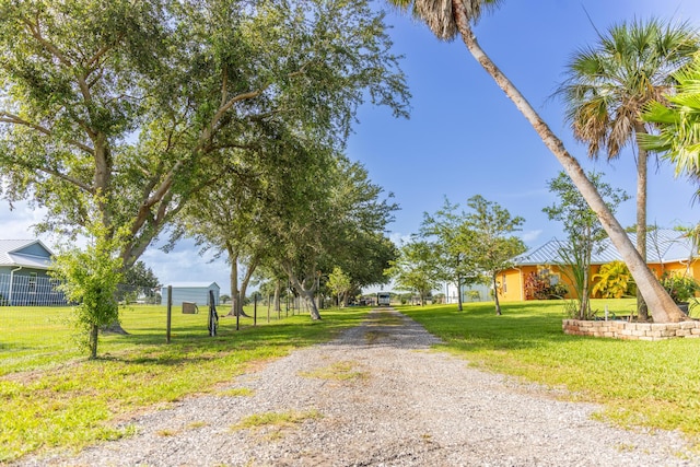 7611 SW 21st Pkwy, Okeechobee, FL 34974 - view of dirt / gravel driveway