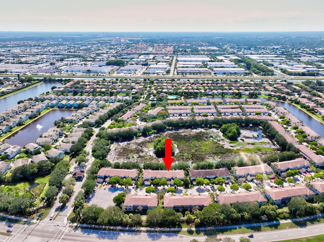 2364 Center Stone Ln, Riviera Beach, FL 33404 - aerial view of property and surrounding area with a nearby body of water and nearby suburban area