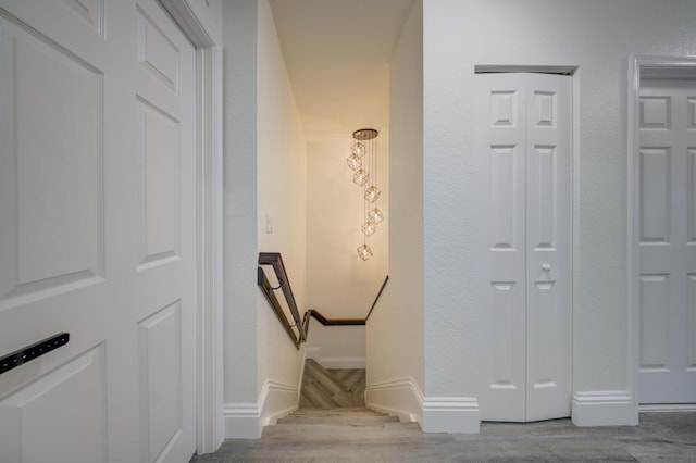 2364 Center Stone Ln, Riviera Beach, FL 33404 - stairway featuring wood finished floors and baseboards