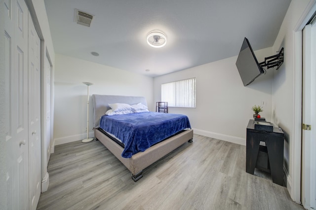 2364 Center Stone Ln, Riviera Beach, FL 33404 - bedroom with light wood-style floors and baseboards