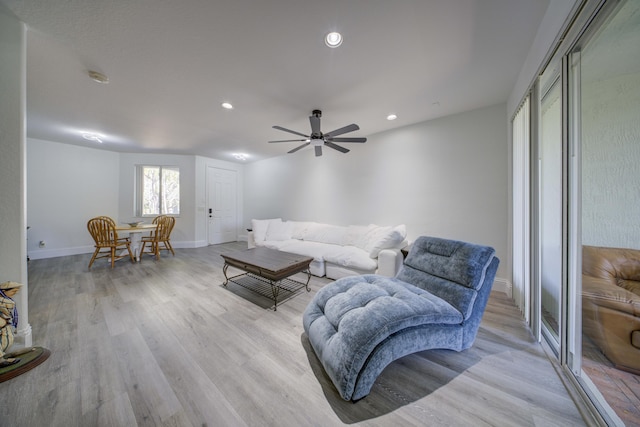 2364 Center Stone Ln, Riviera Beach, FL 33404 - living area featuring light wood-style flooring, baseboards, recessed lighting, and a ceiling fan