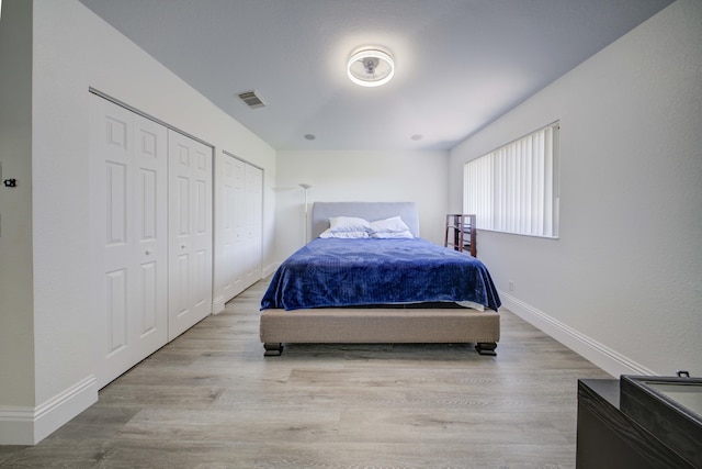 2364 Center Stone Ln, Riviera Beach, FL 33404 - bedroom featuring wood finished floors and baseboards