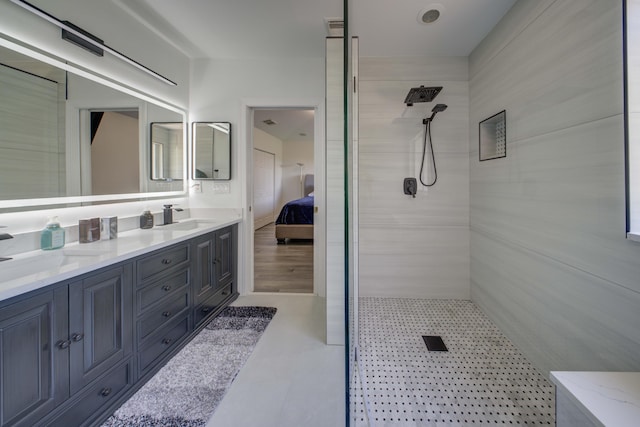2364 Center Stone Ln, Riviera Beach, FL 33404 - bathroom with ensuite bathroom, double vanity, and a tile shower