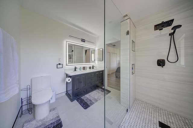 2364 Center Stone Ln, Riviera Beach, FL 33404 - bathroom featuring tiled shower, double vanity, and toilet