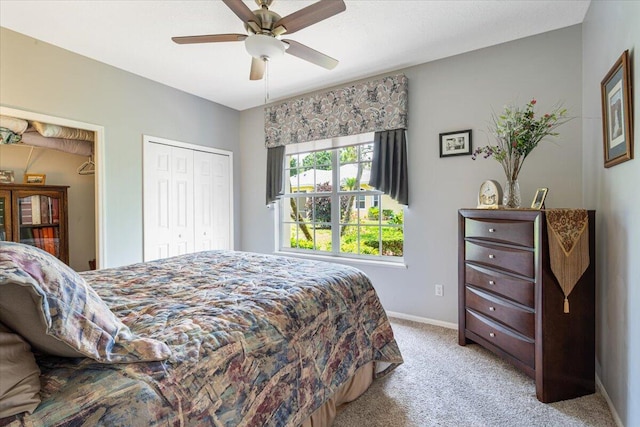 10312 Inverness Way, Port Saint Lucie, FL 34986 - bedroom featuring light carpet, a closet, a ceiling fan, and baseboards